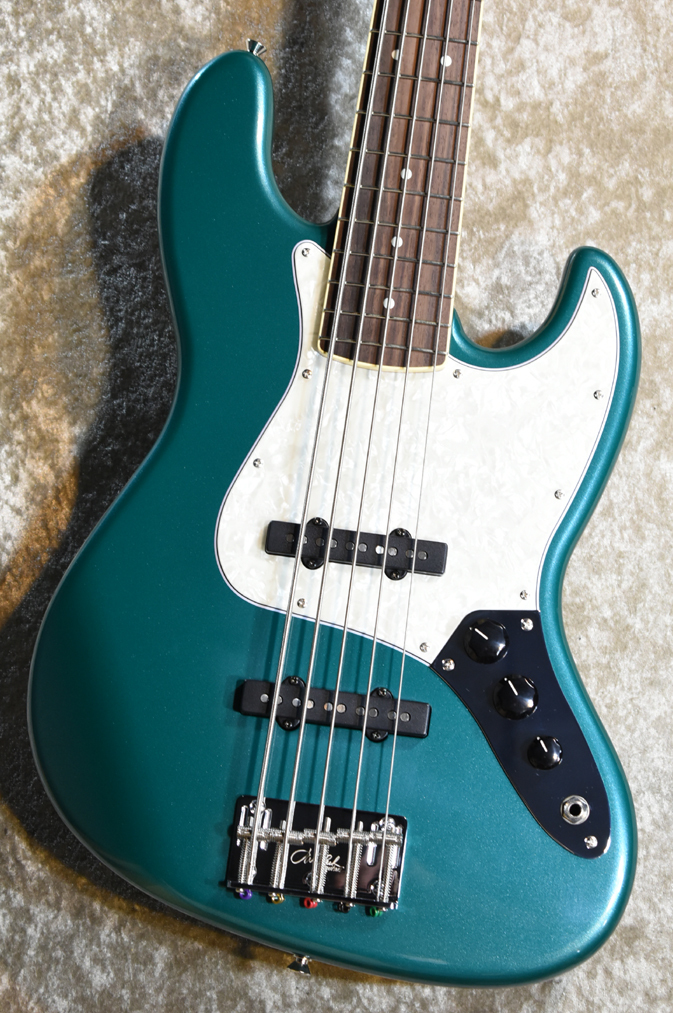 black guitars emerald
