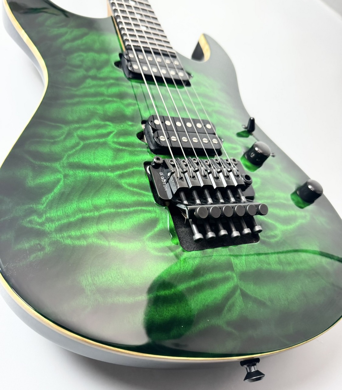 Suhr Custom Modern Carve Top Ash/Pau Ferro/Ebony -Trans Green