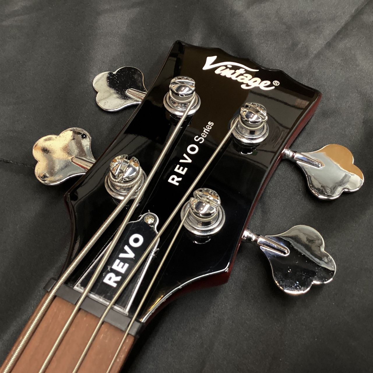 Vintage VRB70CR REVO Series 'Callan' Bass/See Thru Cherry Red