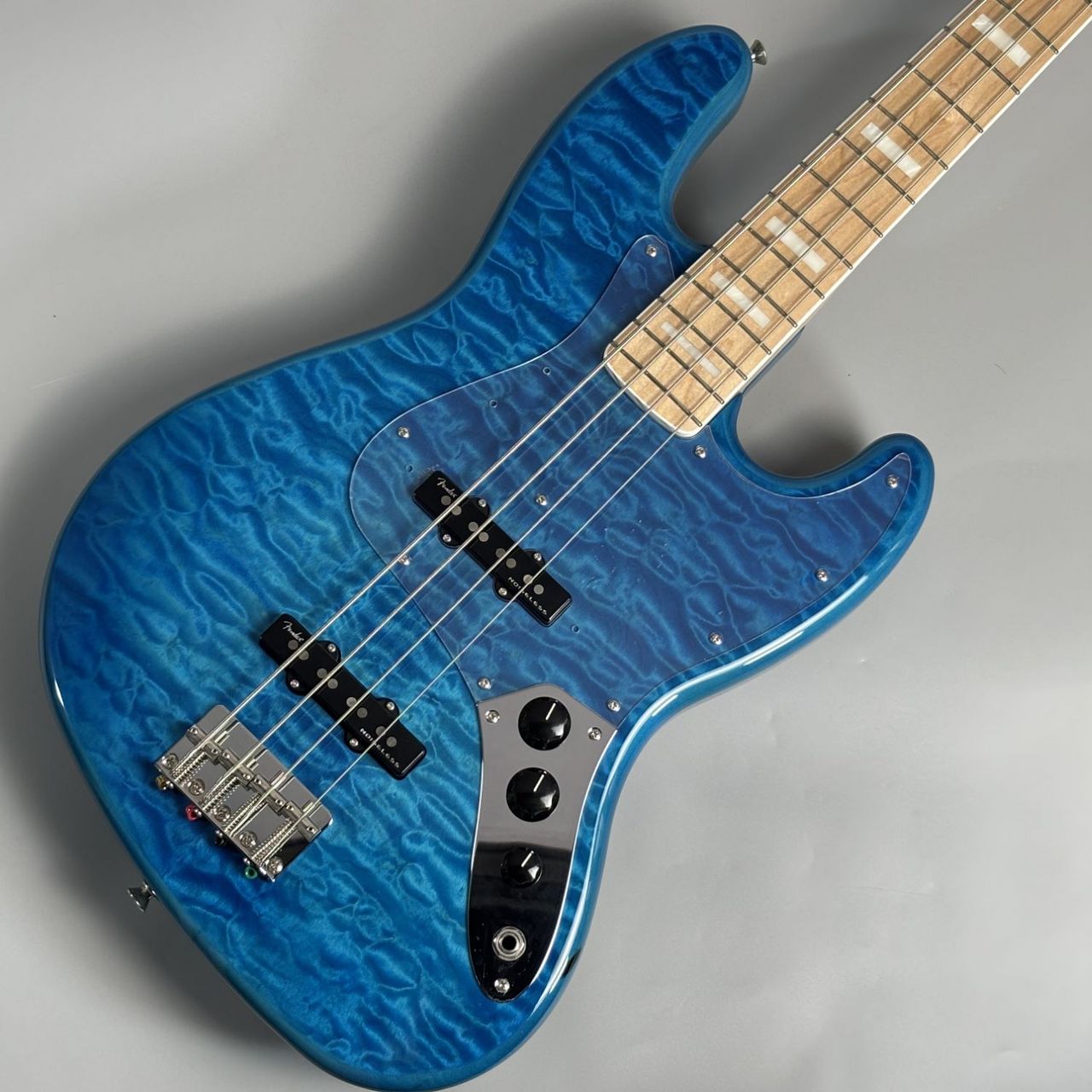 Fender FSR MIJ Traditional II 70s JazzBass Carribian Blue Trans