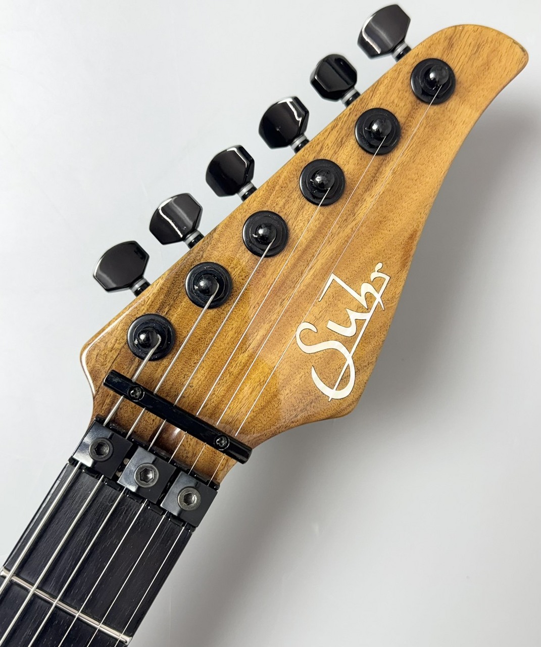 Suhr Custom Modern Carve Top Ash/Pau Ferro/Ebony -Trans Green