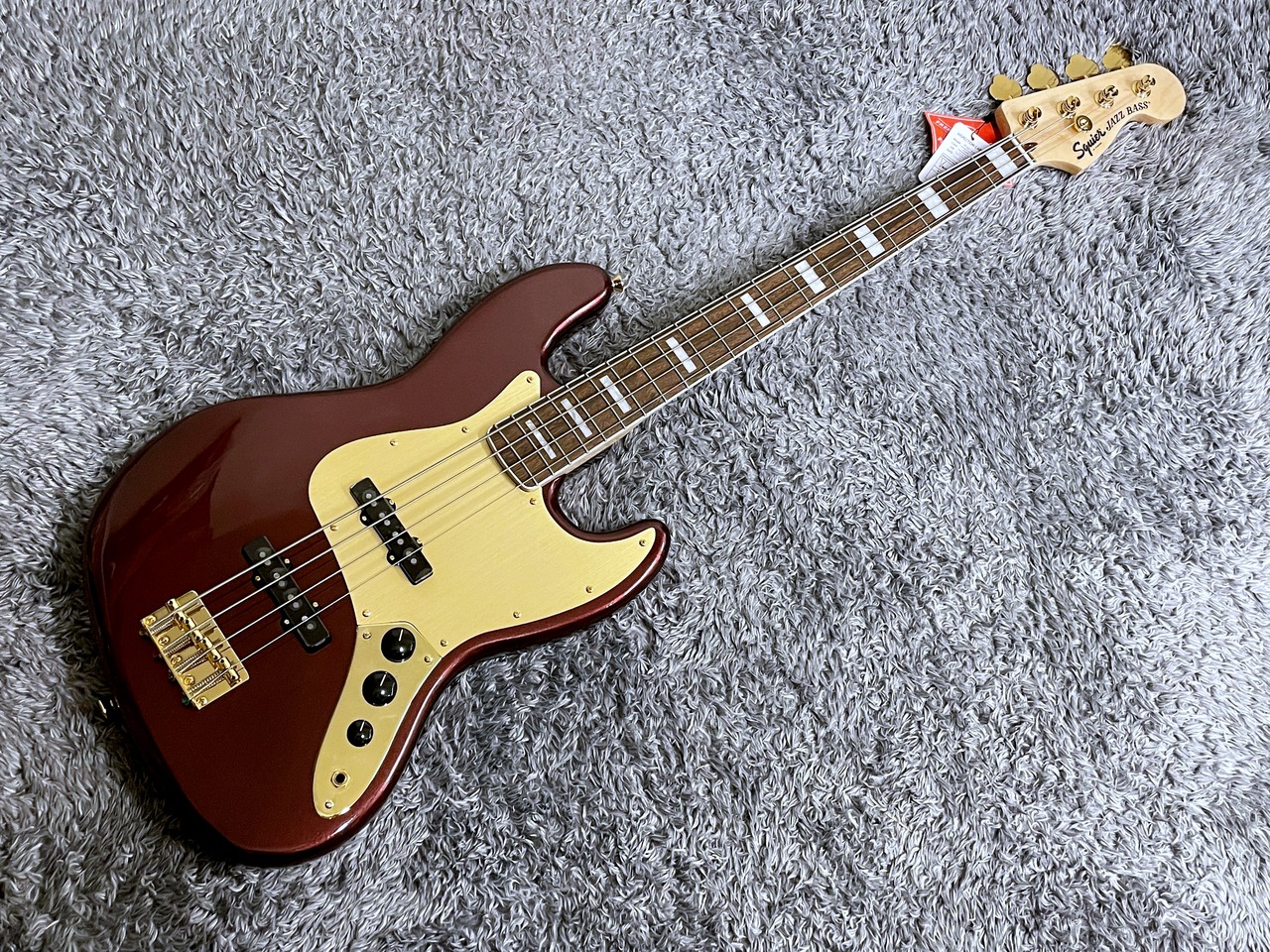 Squier by Fender 40th Anniversary Jazz Bass Gold Edition Ruby Red