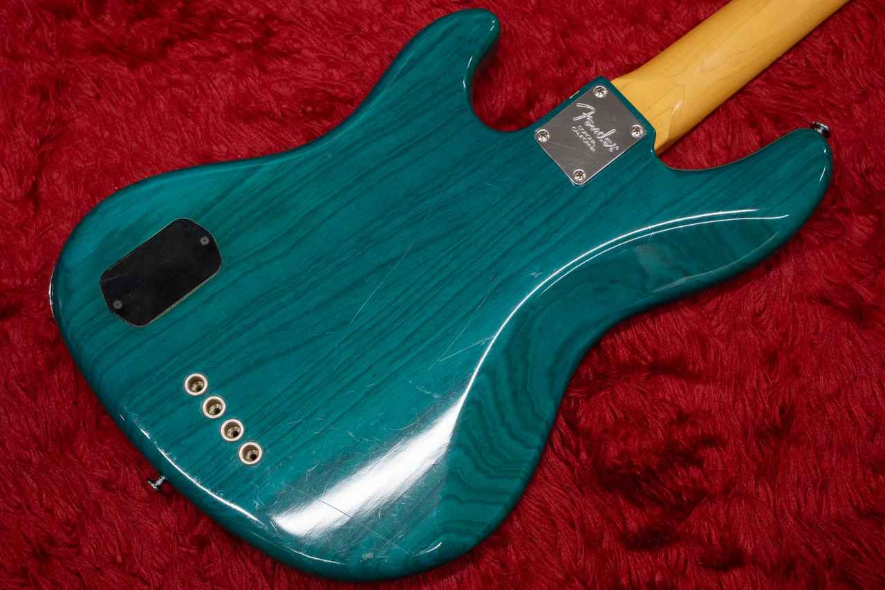 Fender American Deluxe Jazz Bass 4st Teal Green Trans 1999